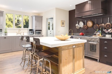 Located in prestigious Greens Farms, this European-inspired - photo 12