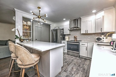 Welcome to this beautiful raised ranch located on a quiet street - photo 15