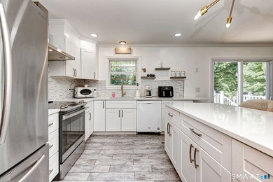 Welcome to this beautiful raised ranch located on a quiet street - photo 17