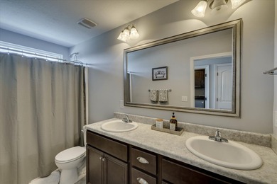 Welcome home to this inviting and well-maintained 4-bedroom, 2