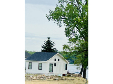 Experience exceptional lake living with 240 feet of prime - photo 1