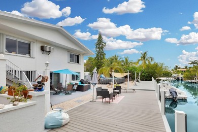 This three bedroom , two bathroom home sits on an expansive 12 - photo 2