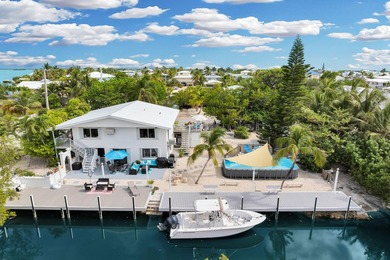 This three bedroom , two bathroom home sits on an expansive 12 - photo 7