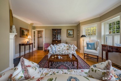 The historic c. 1904 Scranton Homestead, described as a Colonial - photo 12