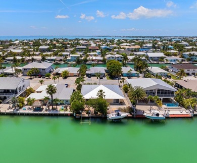 You Deserve this East Facing, Updated 3 Bedroom Island Home! - photo 1