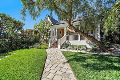 Experience timeless elegance and coastal charm in this - photo 1