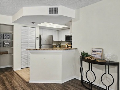 LAKE VIEWS, A PRIVATE GARAGE, AND RESORT-STYLE AMENITIES IN THE - photo 11