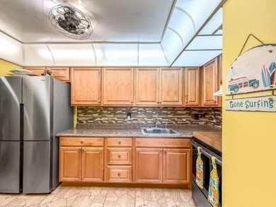 BEAUTIFULLY UPDATED LAKEVIEW CONDO WITH IMPACT GLASS PATIO/LANAI - photo 12