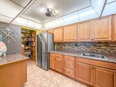BEAUTIFULLY UPDATED LAKEVIEW CONDO WITH IMPACT GLASS PATIO/LANAI - photo 13