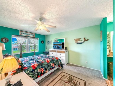BEAUTIFULLY UPDATED LAKEVIEW CONDO WITH IMPACT GLASS PATIO/LANAI - photo 16
