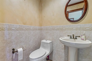 Spacious Colonial In East Patchogue Awaits! This 9-room Colonial - photo 17