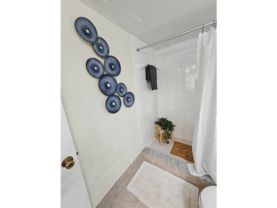 LAKE VIEWS, A PRIVATE GARAGE, AND RESORT-STYLE AMENITIES IN THE - photo 22