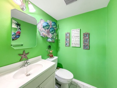 BEAUTIFULLY UPDATED LAKEVIEW CONDO WITH IMPACT GLASS PATIO/LANAI - photo 24