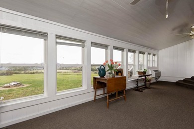 Looking for a home with a beautiful lake view? This inviting - photo 10