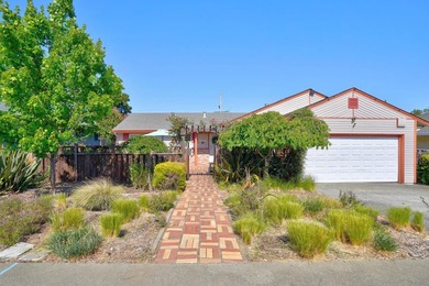 Tucked behind a charming brick-enclosed patio, this 3 bedroom - photo 1