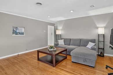Tucked behind a charming brick-enclosed patio, this 3 bedroom - photo 4