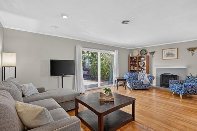 Tucked behind a charming brick-enclosed patio, this 3 bedroom - photo 5