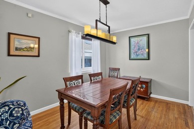 Tucked behind a charming brick-enclosed patio, this 3 bedroom - photo 6