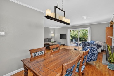 Tucked behind a charming brick-enclosed patio, this 3 bedroom - photo 7