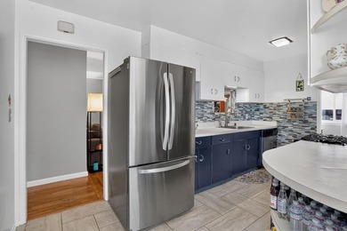 Tucked behind a charming brick-enclosed patio, this 3 bedroom - photo 10