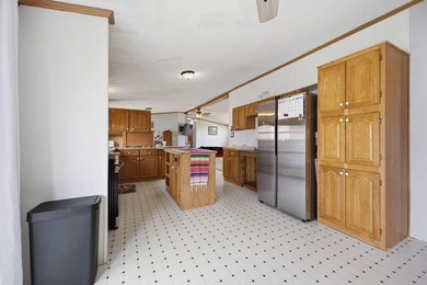 The seller is willing to cover 6 months of lot rent with the - photo 14
