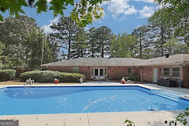 Secluded Brick Ranch Retreat on 20+ Acres with Private Lake & - photo 32