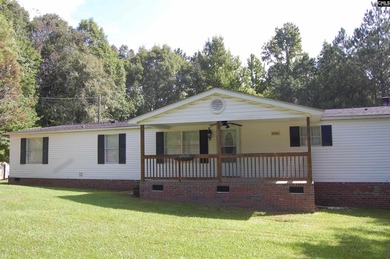 Lake Home For Sale in Prosperity, South Carolina