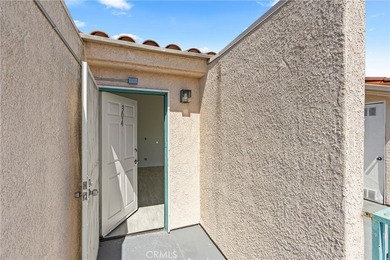 Welcome to this bright and inviting top-floor condominium in one - photo 3