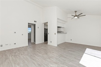 Welcome to this bright and inviting top-floor condominium in one - photo 5