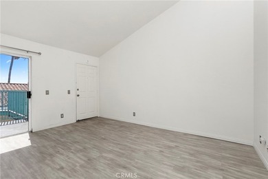 Welcome to this bright and inviting top-floor condominium in one - photo 8