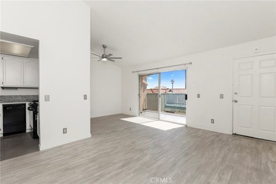 Welcome to this bright and inviting top-floor condominium in one - photo 10