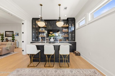 Located in the prestigious gated golf community of Le Triomphe