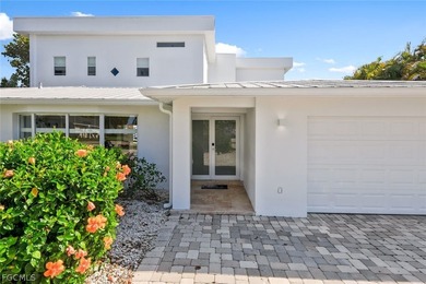 Discover this unique and elegant 2-story waterfront mansion in - photo 12