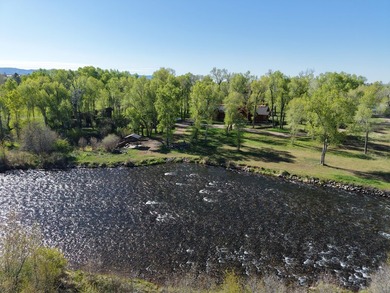 This unique property features a beautiful 2,678 Sq Ft custom log - photo 2