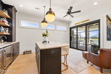 Located in the prestigious gated golf community of Le Triomphe