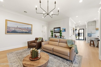 Located in the prestigious gated golf community of Le Triomphe