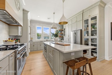 Located in the prestigious gated golf community of Le Triomphe