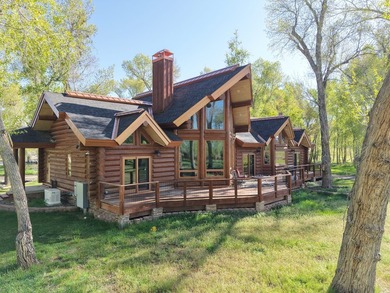 This unique property features a beautiful 2,678 Sq Ft custom log - photo 7