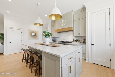 Located in the prestigious gated golf community of Le Triomphe