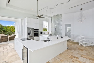 Discover this unique and elegant 2-story waterfront mansion in - photo 18