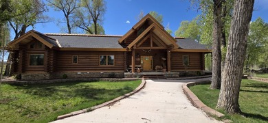 This unique property features a beautiful 2,678 Sq Ft custom log - photo 8