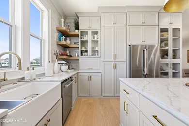 Located in the prestigious gated golf community of Le Triomphe