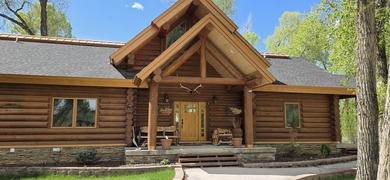 This unique property features a beautiful 2,678 Sq Ft custom log - photo 9