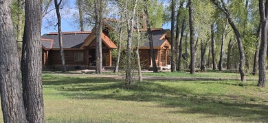 This unique property features a beautiful 2,678 Sq Ft custom log - photo 10