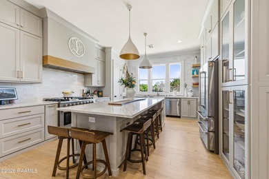 Located in the prestigious gated golf community of Le Triomphe