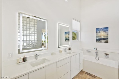 Discover this unique and elegant 2-story waterfront mansion in - photo 25