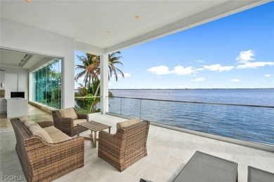 Discover this unique and elegant 2-story waterfront mansion in - photo 28