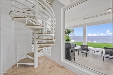 Discover this unique and elegant 2-story waterfront mansion in - photo 29