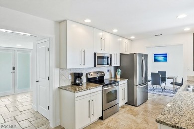Discover this unique and elegant 2-story waterfront mansion in - photo 38