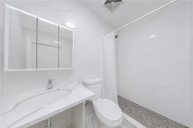 Exceptional, fully renovated legal two-family brick property - photo 17